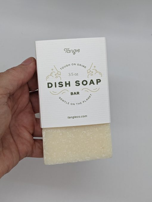 Tangie brand Dish Soap bar in hand